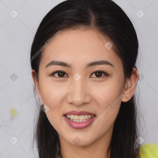Joyful white young-adult female with medium  brown hair and brown eyes