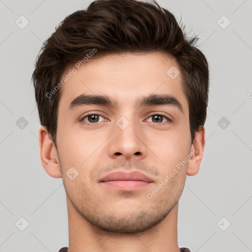 Neutral white young-adult male with short  brown hair and brown eyes