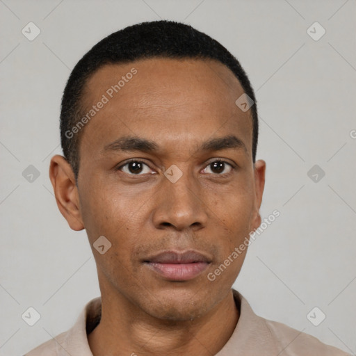 Neutral latino young-adult male with short  black hair and brown eyes