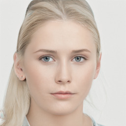 Neutral white young-adult female with long  blond hair and blue eyes