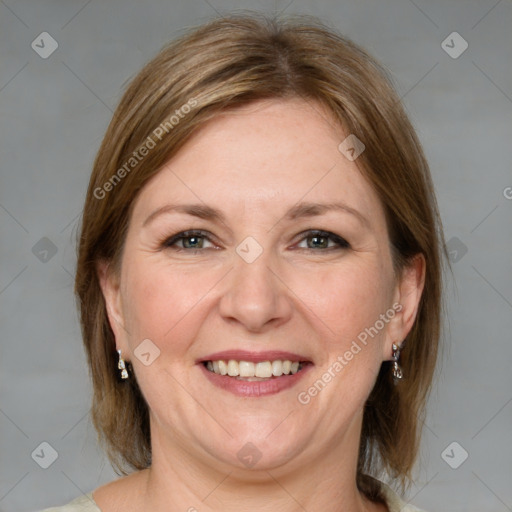 Joyful white adult female with medium  brown hair and grey eyes