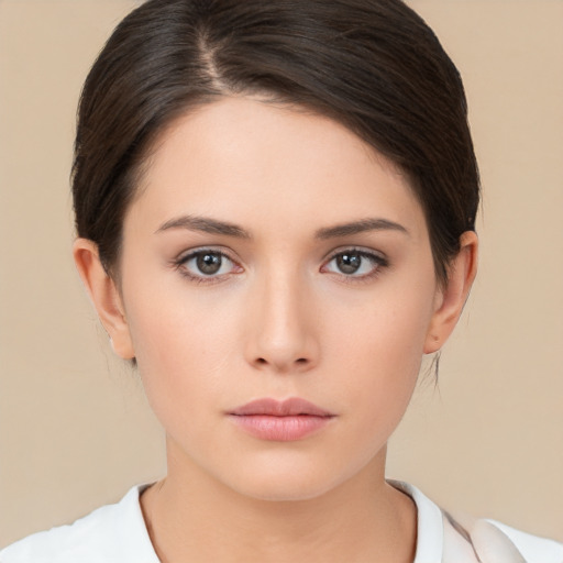 Neutral white young-adult female with medium  brown hair and brown eyes