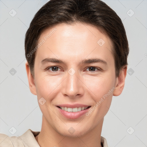 Joyful white young-adult female with short  brown hair and brown eyes