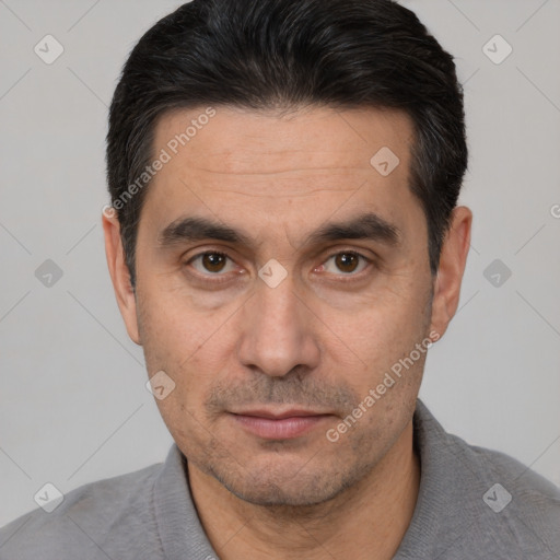 Neutral white adult male with short  black hair and brown eyes