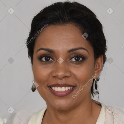 Joyful black young-adult female with medium  brown hair and brown eyes