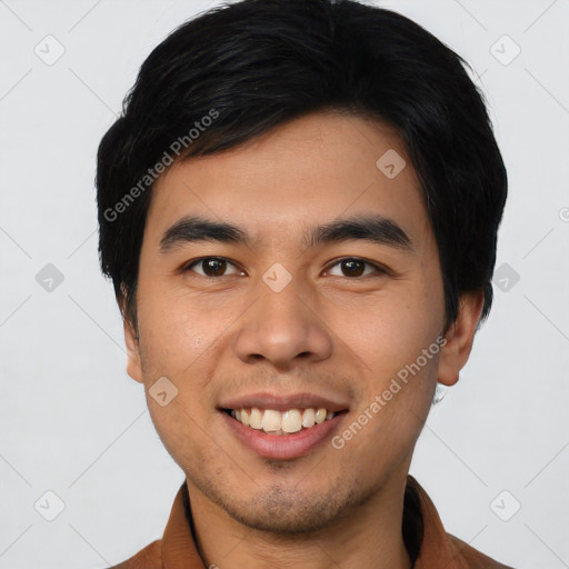 Joyful asian young-adult male with short  black hair and brown eyes