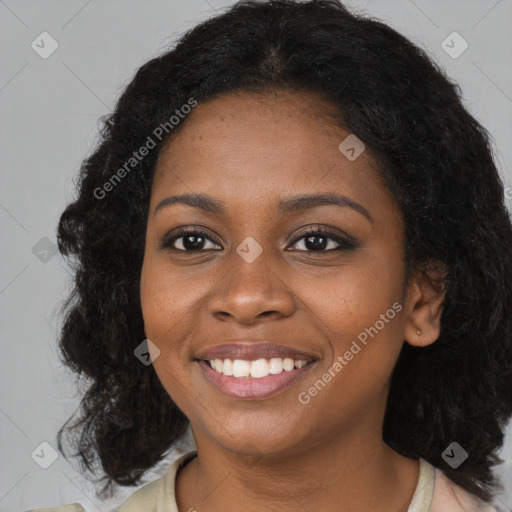 Joyful black young-adult female with medium  black hair and brown eyes