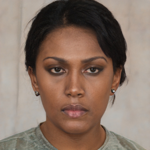 Neutral latino young-adult female with medium  black hair and brown eyes