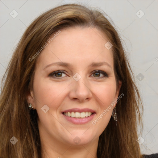 Joyful white adult female with long  brown hair and grey eyes