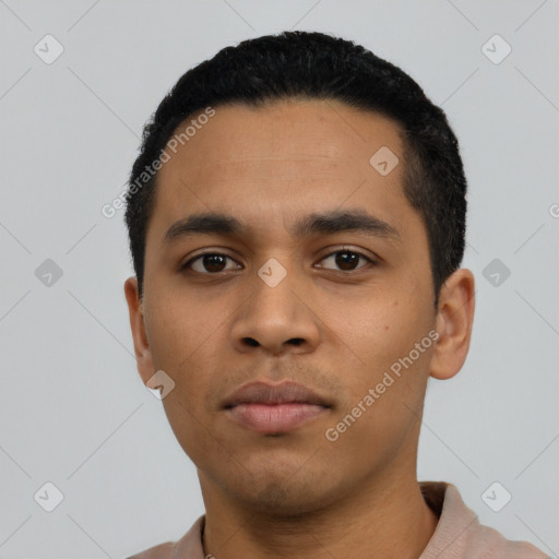 Neutral latino young-adult male with short  black hair and brown eyes