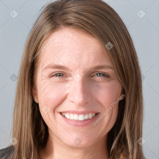Joyful white young-adult female with long  brown hair and grey eyes