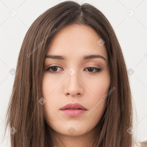 Neutral white young-adult female with long  brown hair and brown eyes