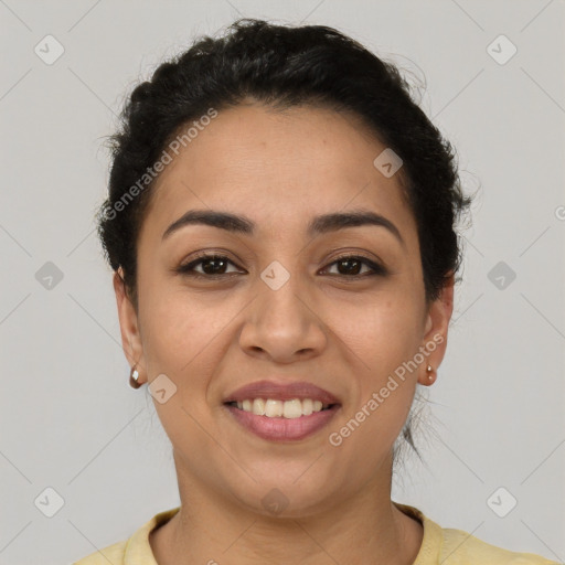 Joyful latino young-adult female with short  brown hair and brown eyes