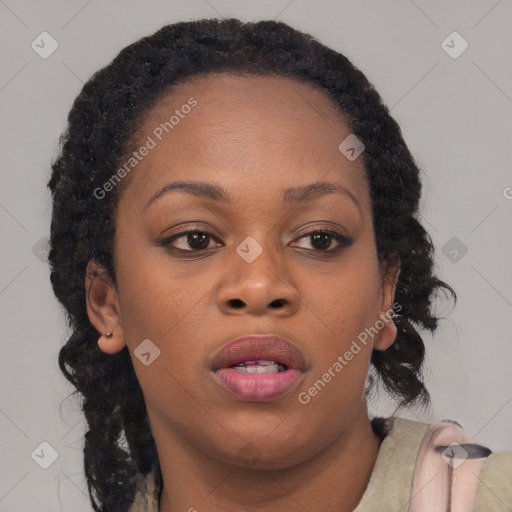 Neutral black young-adult female with long  brown hair and brown eyes
