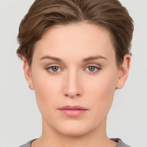 Neutral white young-adult female with short  brown hair and brown eyes