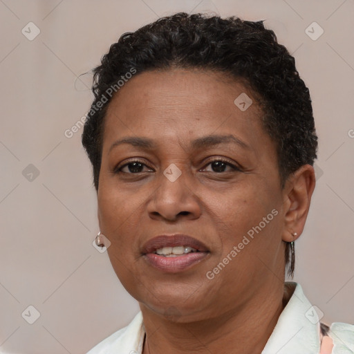 Joyful latino adult female with short  brown hair and brown eyes