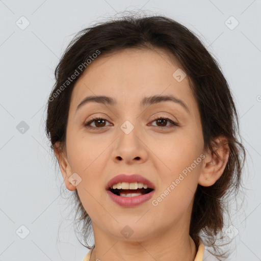 Joyful white young-adult female with medium  brown hair and brown eyes