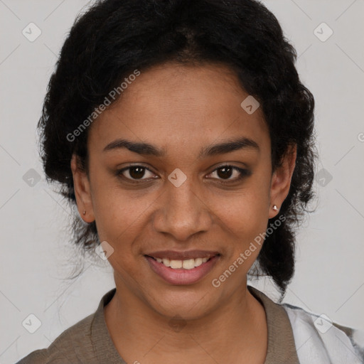 Joyful latino young-adult female with short  black hair and brown eyes