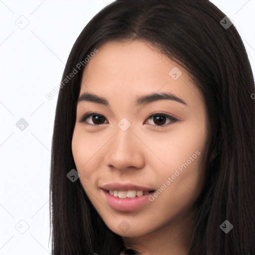 Joyful white young-adult female with long  black hair and brown eyes