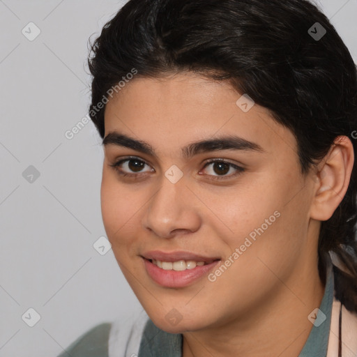 Joyful latino young-adult female with medium  brown hair and brown eyes