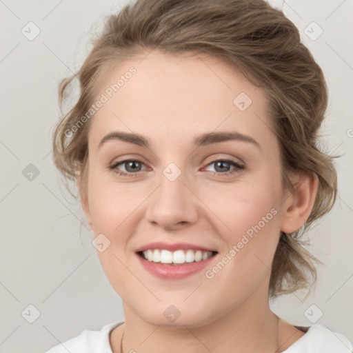 Joyful white young-adult female with medium  brown hair and green eyes