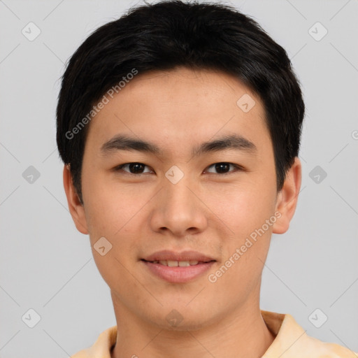 Joyful asian young-adult male with short  brown hair and brown eyes