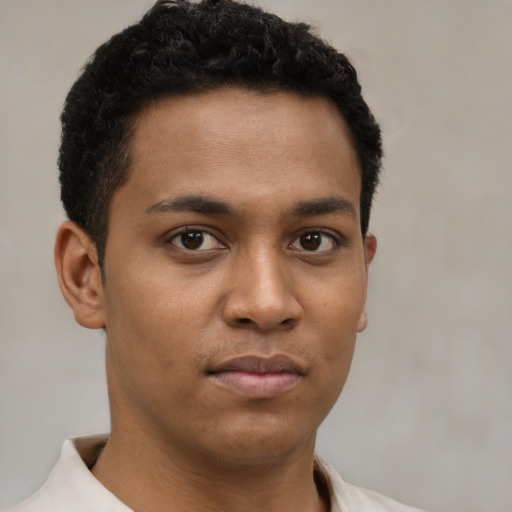 Neutral black young-adult male with short  brown hair and brown eyes