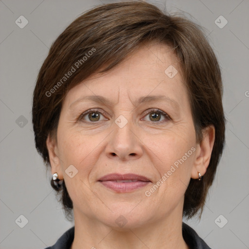 Joyful white adult female with medium  brown hair and grey eyes