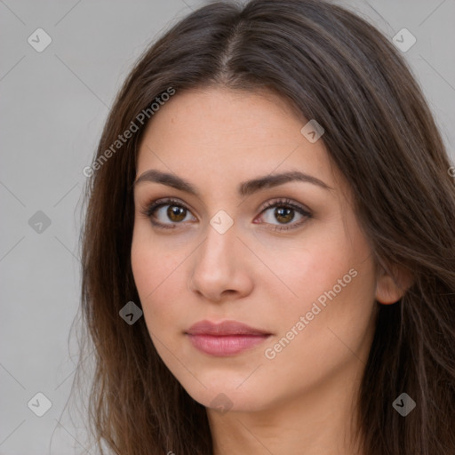 Neutral white young-adult female with long  brown hair and brown eyes