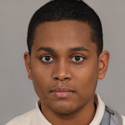 Neutral latino young-adult male with short  brown hair and brown eyes