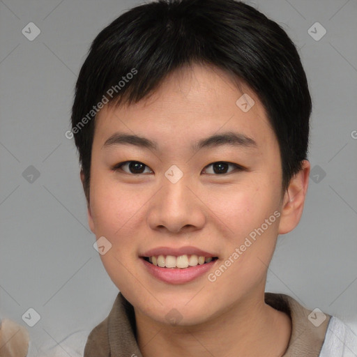 Joyful asian young-adult female with short  brown hair and brown eyes