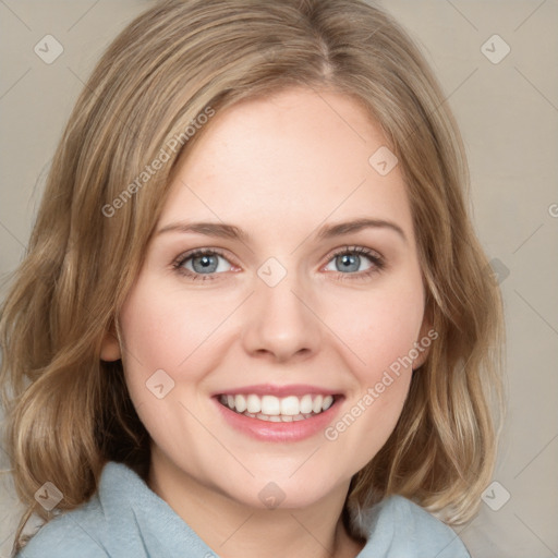 Joyful white young-adult female with medium  brown hair and blue eyes