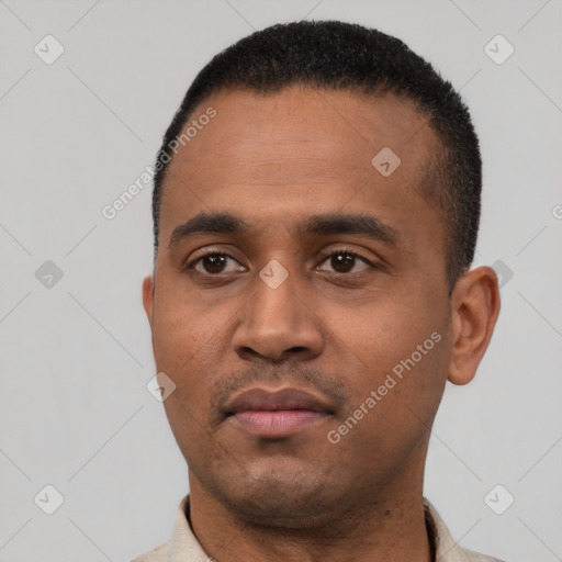 Neutral latino young-adult male with short  black hair and brown eyes