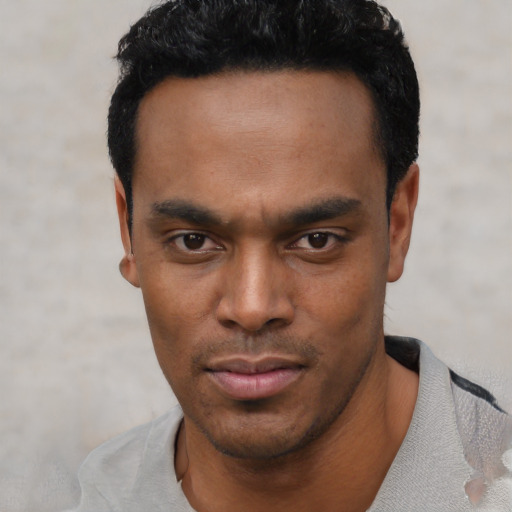 Neutral black young-adult male with short  black hair and brown eyes