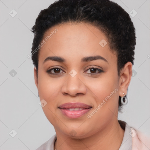 Joyful latino young-adult female with short  black hair and brown eyes