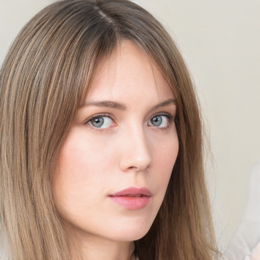 Neutral white young-adult female with long  brown hair and green eyes