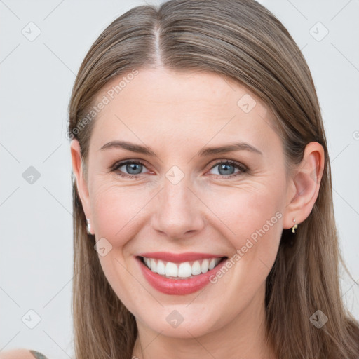 Joyful white young-adult female with long  brown hair and grey eyes