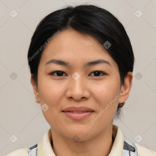 Joyful asian young-adult female with medium  black hair and brown eyes