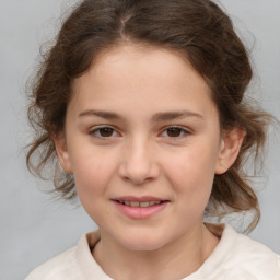 Joyful white child female with medium  brown hair and brown eyes