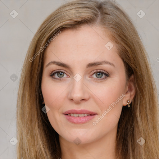 Joyful white young-adult female with long  brown hair and green eyes