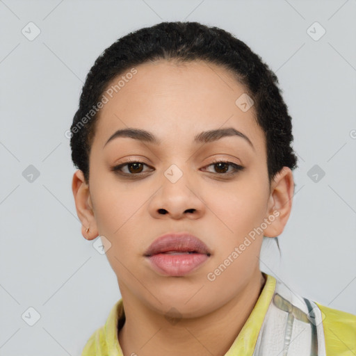 Joyful latino young-adult female with short  black hair and brown eyes