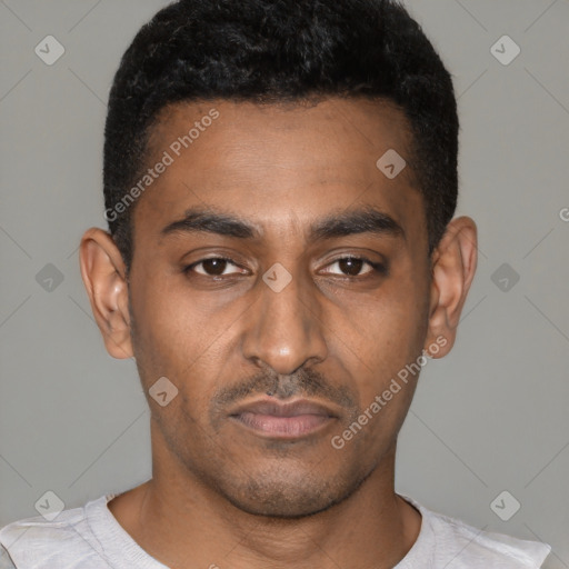 Neutral latino young-adult male with short  black hair and brown eyes