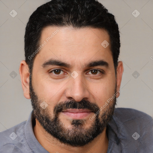 Joyful white young-adult male with short  black hair and brown eyes