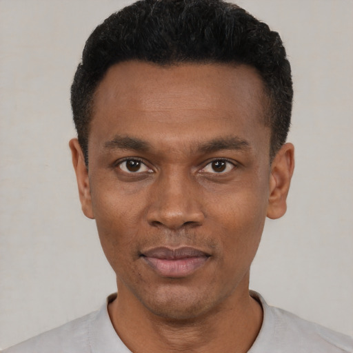 Neutral black young-adult male with short  black hair and brown eyes