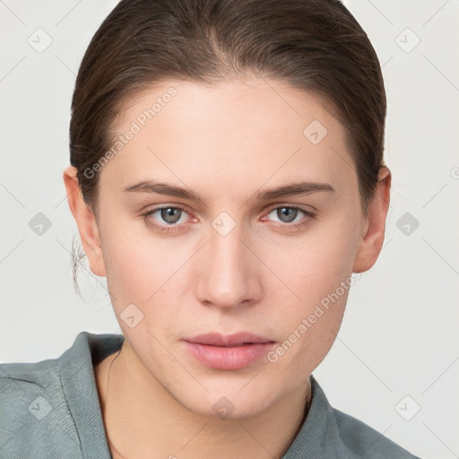 Neutral white young-adult female with short  brown hair and grey eyes