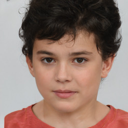 Joyful white child male with short  brown hair and brown eyes