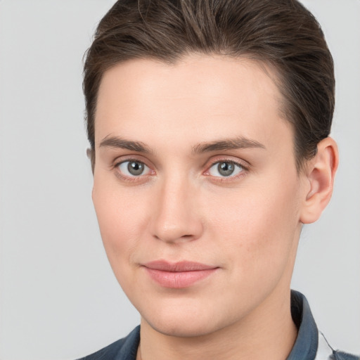 Joyful white young-adult male with medium  brown hair and brown eyes