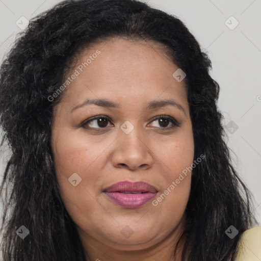 Joyful latino adult female with long  brown hair and brown eyes