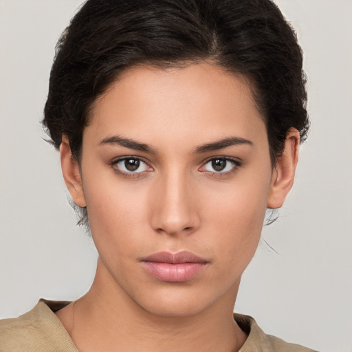 Neutral white young-adult female with short  brown hair and brown eyes