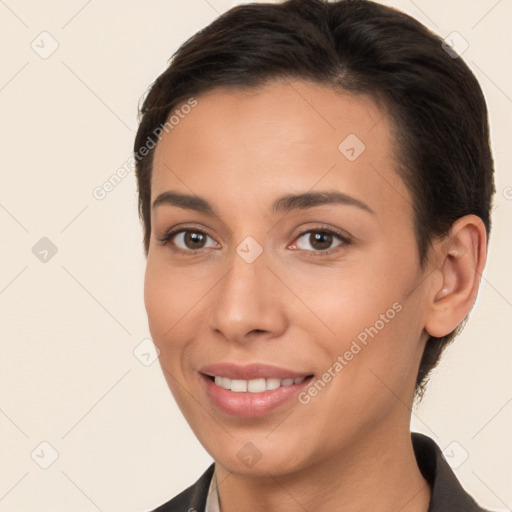 Joyful white young-adult female with short  brown hair and brown eyes